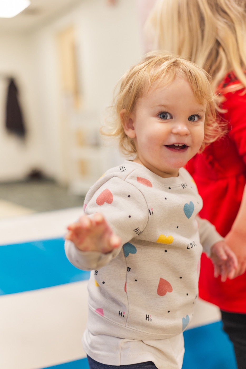 A toddler in the Sojourn Kids classroom